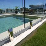 Details of frameless glass pool fence