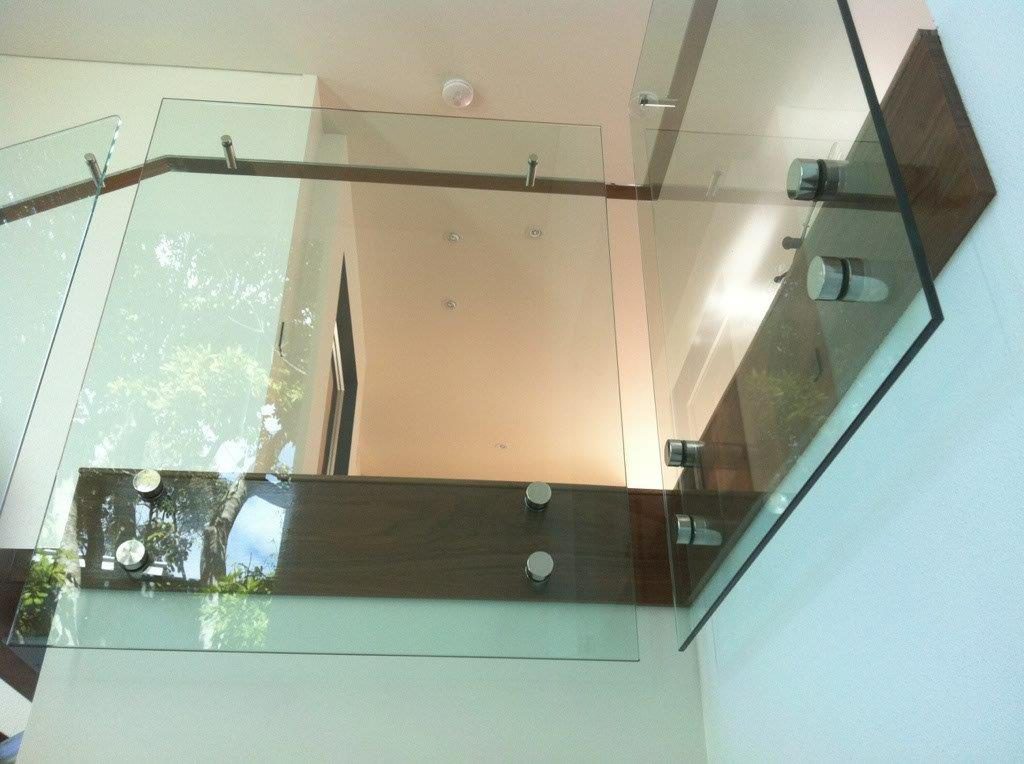 Glass balustrade on stairway inside a house