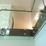 Glass balustrade on stairway inside a house